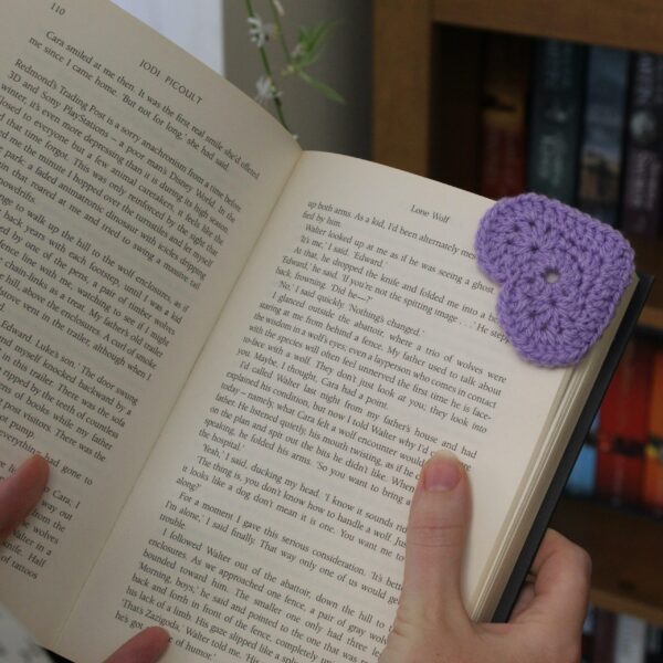 The perfect handcrafted stocking filler gift for any bookworm - a beautiful crocheted heart corner bookmark.