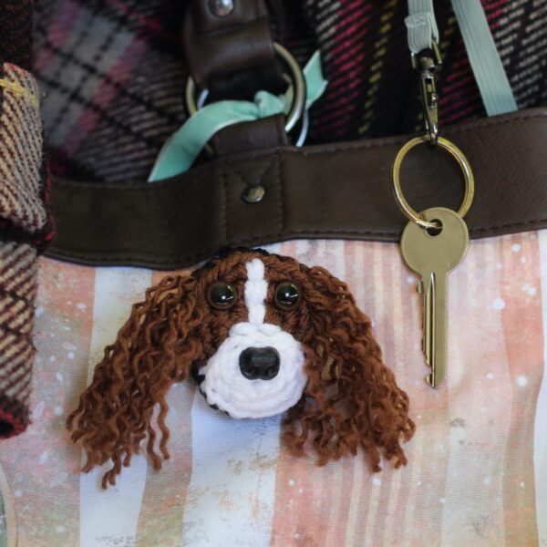 A personalised crocheted face of your pooch, created from your photographs and lovingly attached to a brooch pin.