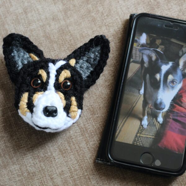 A personalised crocheted face of your pooch, created from your photographs and lovingly attached to a brooch pin.