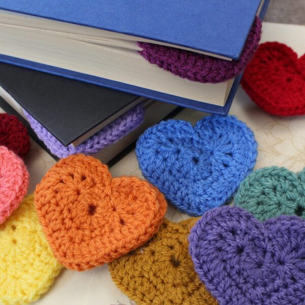 The perfect handcrafted stocking filler gift for any bookworm - a beautiful crocheted heart corner bookmark.