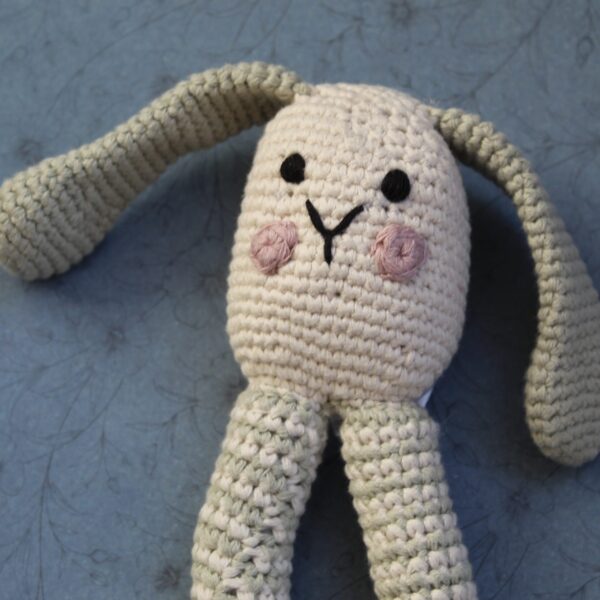 A beautifully handcrafted bunny baby rattle, the perfect gift for any little one.