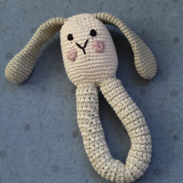 A beautifully handcrafted bunny baby rattle, the perfect gift for any little one.