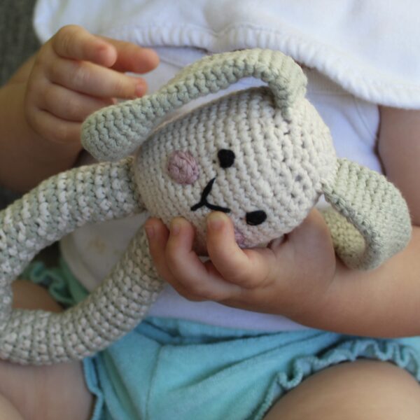 A beautifully handcrafted bunny baby rattle, the perfect gift for any little one.