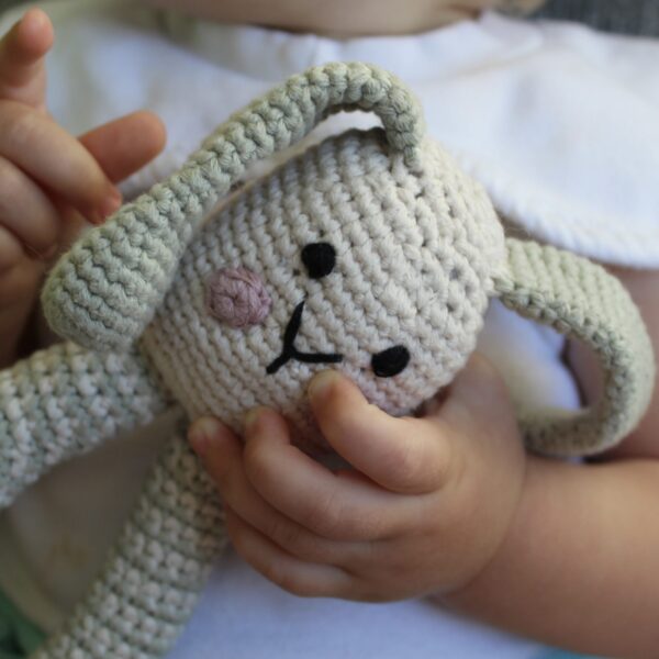 A beautifully handcrafted bunny baby rattle, the perfect gift for any little one.