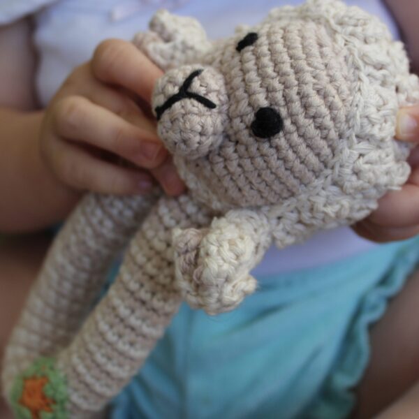 A beautifully handcrafted lamb baby rattle, the perfect gift for any little one.