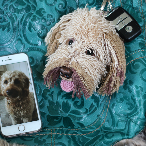 A personalised crochet soft toy head of your pooch created from photographs of your furry companion, lovingly attached to a hanging silver lobster clasp.