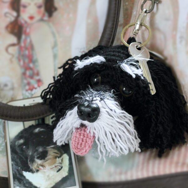 A personalised crochet soft toy head of your pooch created from photographs of your furry companion, lovingly attached to a hanging silver lobster clasp.