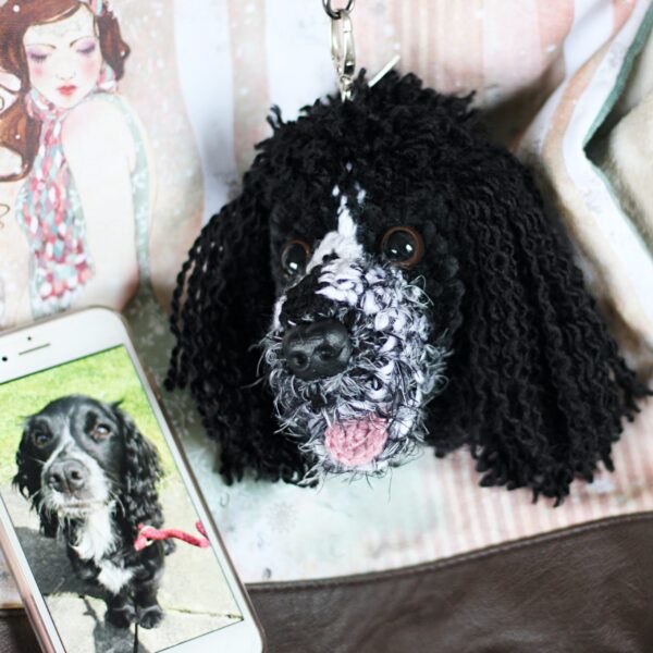 A personalised crochet soft toy head of your pooch created from photographs of your furry companion, lovingly attached to a hanging silver lobster clasp.