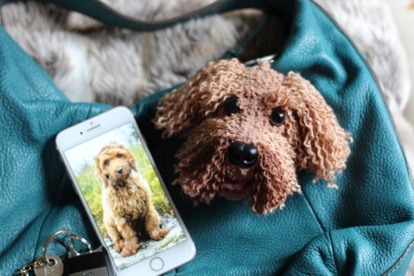 A personalised crochet soft toy head of your pooch created from photographs of your furry companion, lovingly attached to a hanging silver lobster clasp.