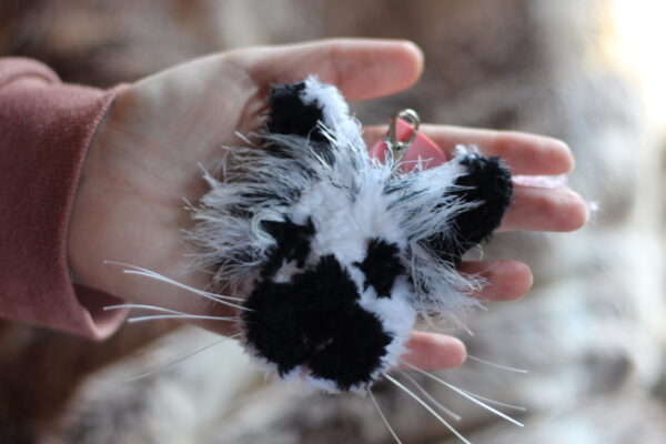 The perfect personalised gift for a small pet owner - a crocheted replica of their best friend's face, created from photographs, on a keyring.