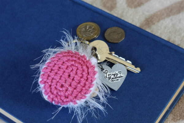 The perfect personalised gift for a small pet owner - a crocheted replica of their best friend's face, created from photographs, on a keyring.